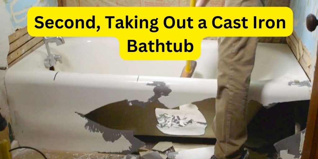 A-man-removing-cast-iron-bathtub